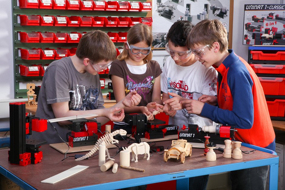 UNIMAT children working with the machines